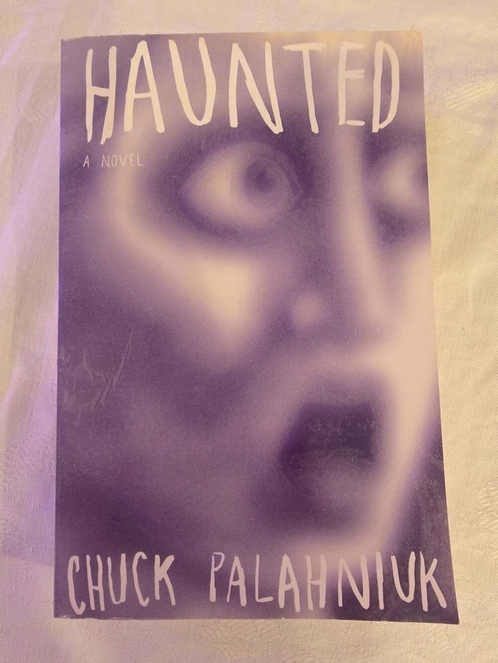 Haunted by Chuck Palahniuk Paperback Novel